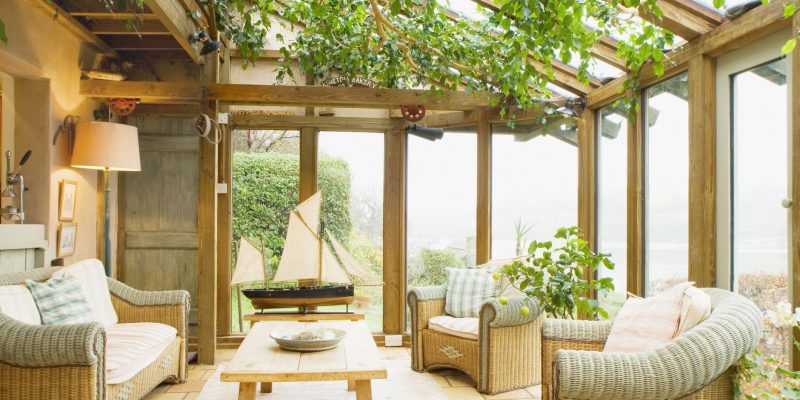 A three seasoned sun-room as the transition of an enclosed patio_Country Living Magazine