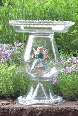 A Figurine Birdbath