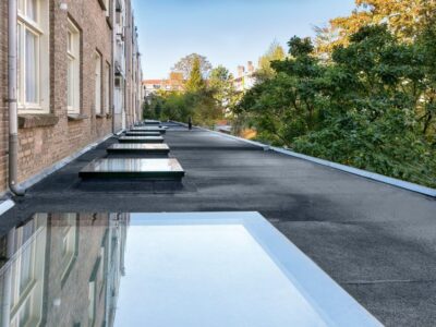 Harmony Beyond the Ceiling: The Benefits of a Flat Roof Access Skylight for Indoor Spaces