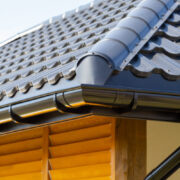Metal gutter on house with Leaf Filter handle, designed to handle heavy rain