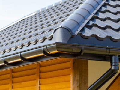 Metal gutter on house with Leaf Filter handle, designed to handle heavy rain