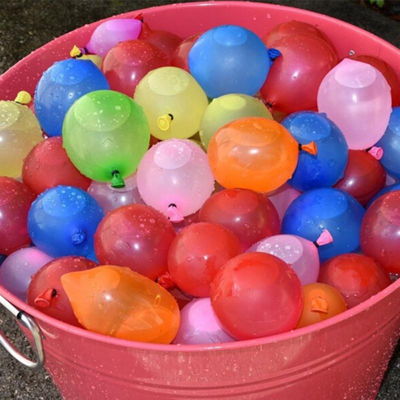 A bucket filled with vibrant balloons