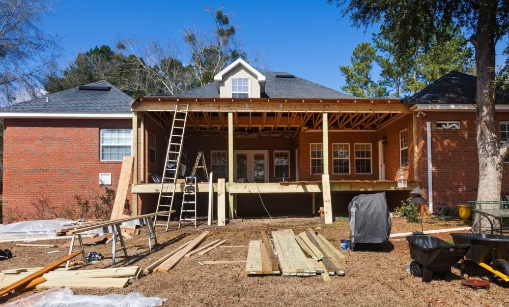 
A house under construction using wood and construction materials