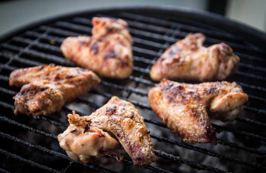Grilled chicken wings on the grill - a European delight. Savor the smoky flavor