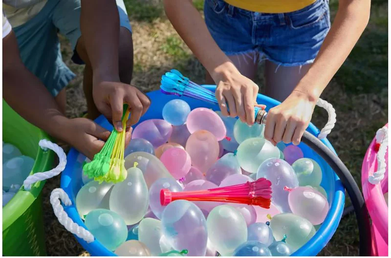 They are likely playing with self-sealing water balloons.