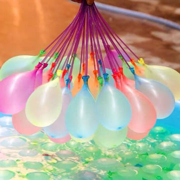 holding colorful balloons in a pool. Enjoying a refreshing dip while surrounded by vibrant balloons.
