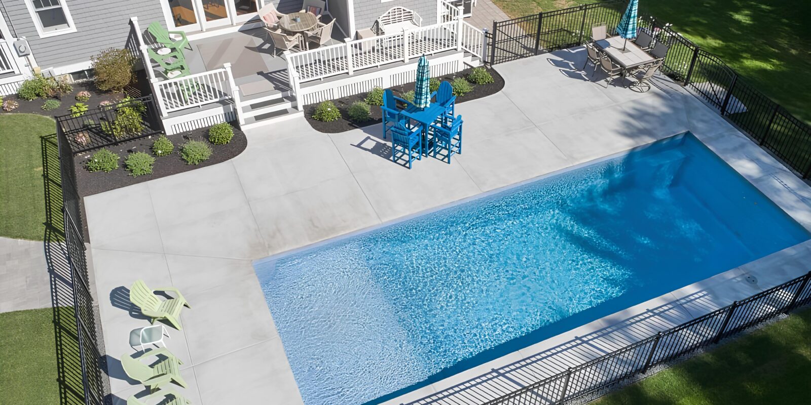 really-like-this-subtle-pool-fence-with-landscaping-on-both-sides